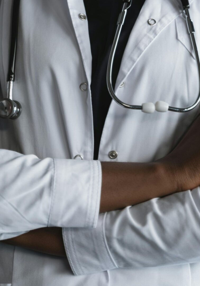 Doctor with crossed arms and stethoscope